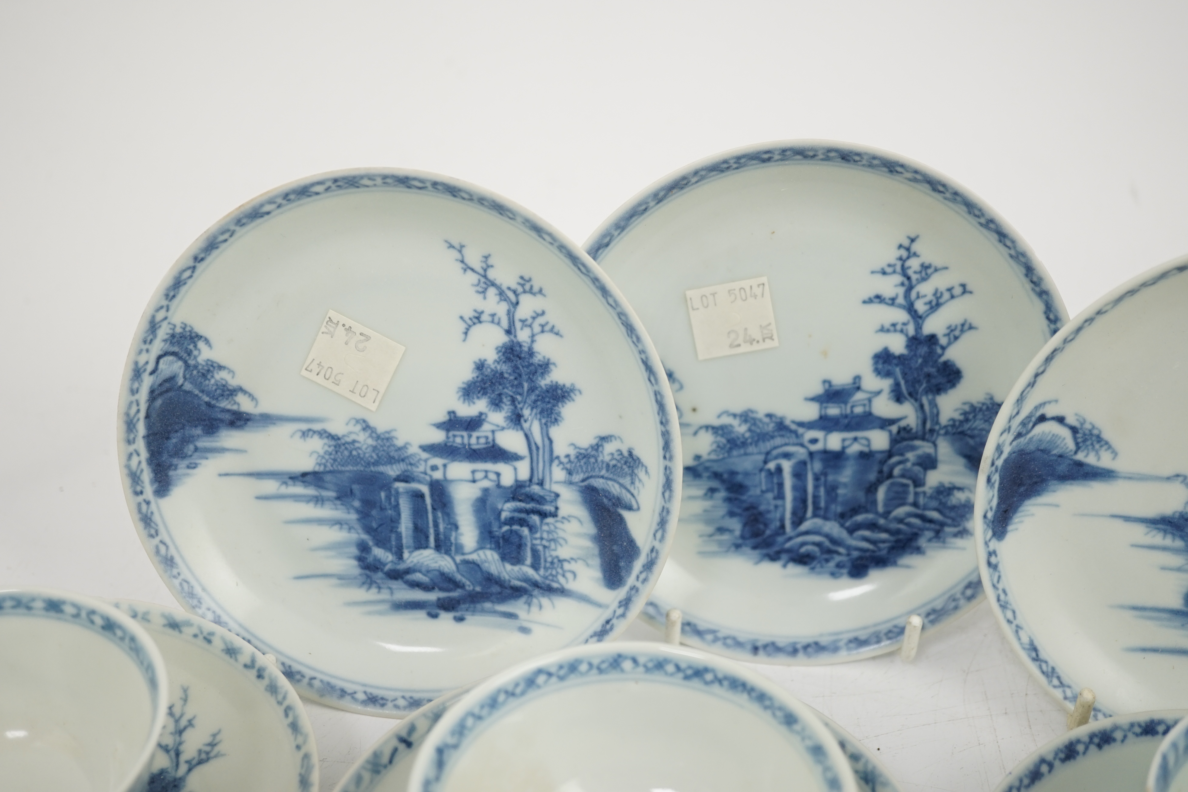 A set of twenty four Chinese Nanking Cargo blue and white ‘large pagoda’ tea bowls and saucers, Qianlong period